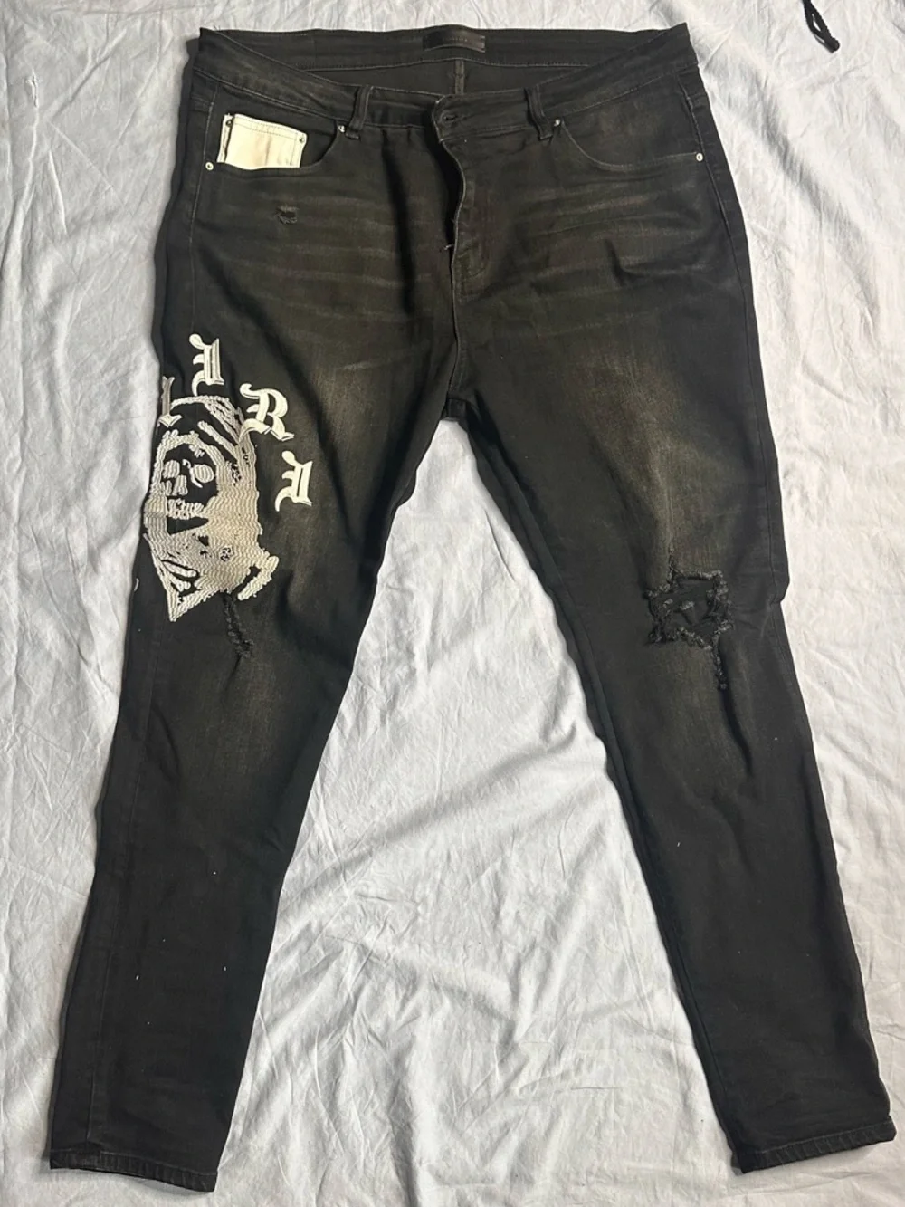 AMIRI Black Skinny Jeans with White Graphic Detailing - Men's - Picture 4 of 16